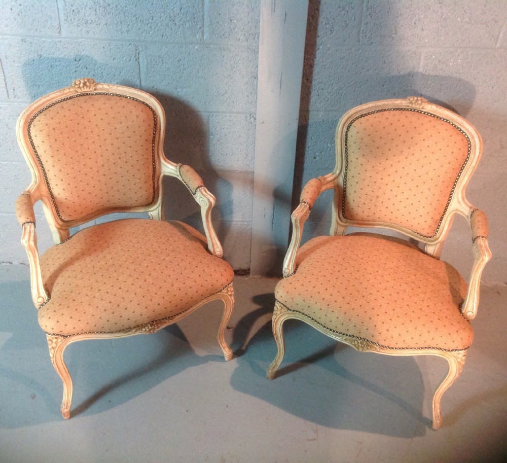 pair of carved french armchairs