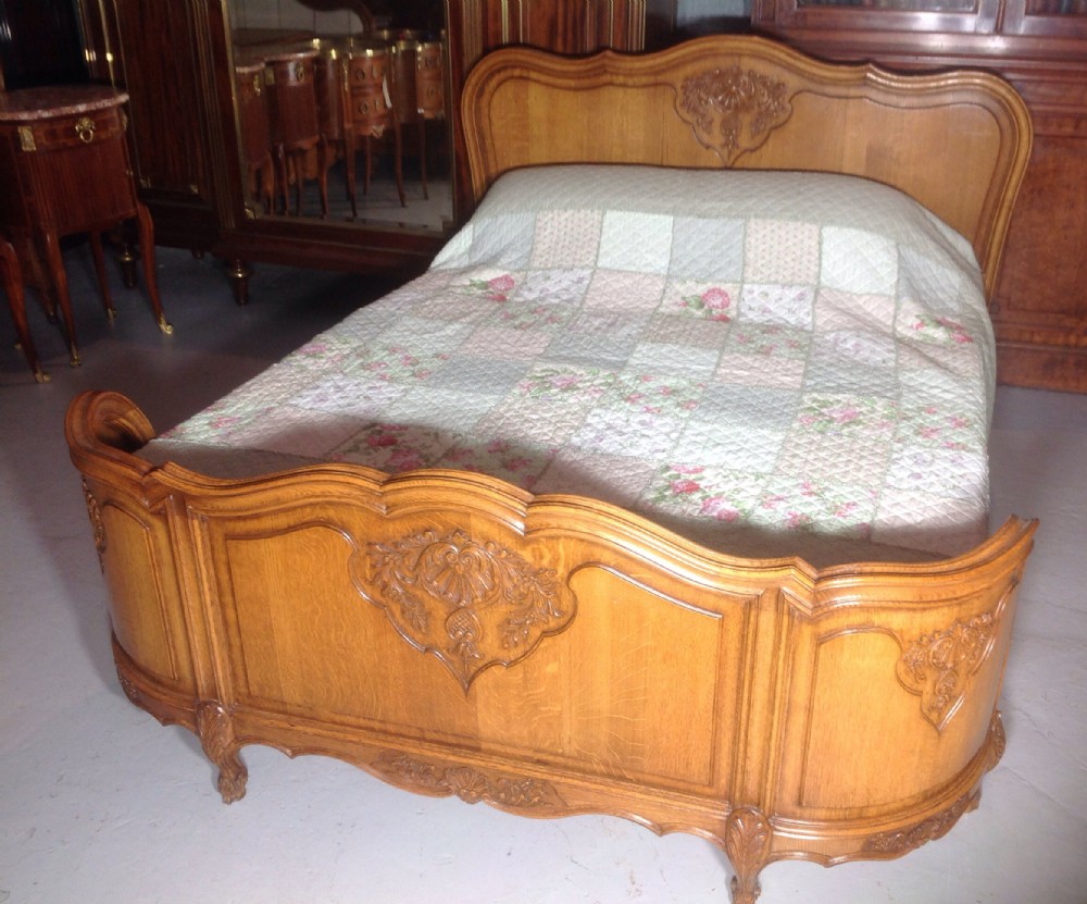 carved oak french corbeille kingsize bed