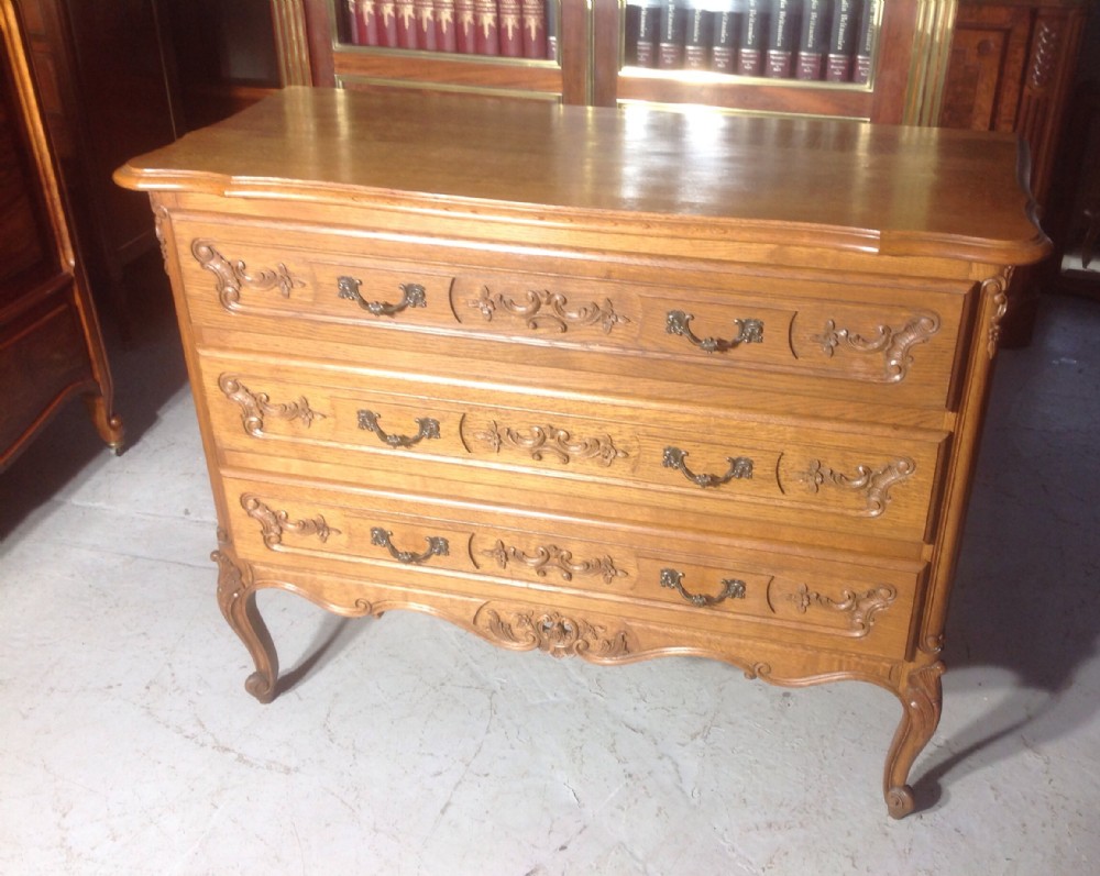 carved oak french chest of drawers