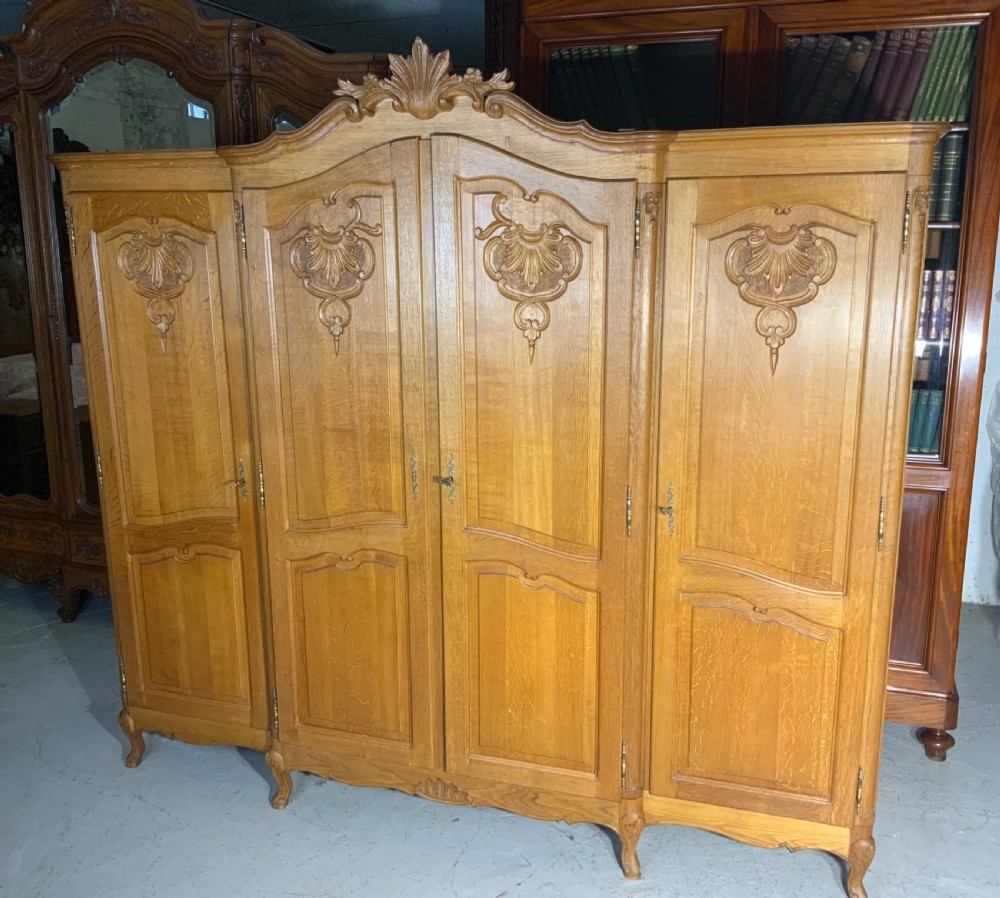 carved oak 4 door french armoire