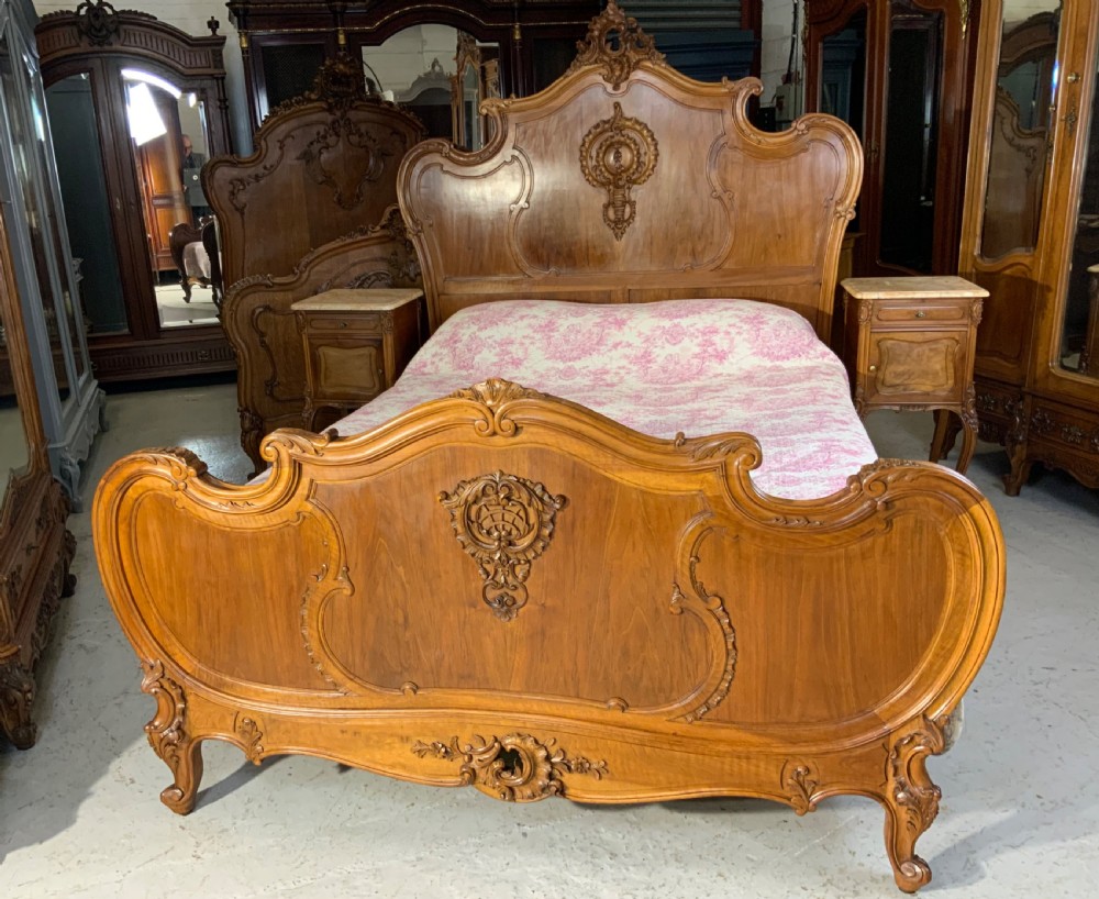 stunning carved walnut french king size bed with matching bedside cabinets