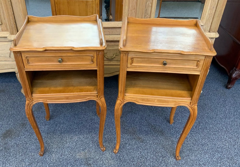 pair of satinwood french bedside cabinets