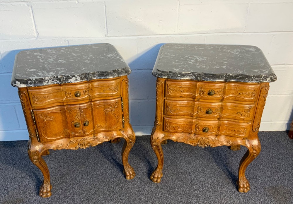 amazing pair of carved oak bedside cabinets