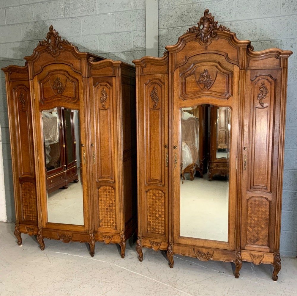 stunning pair of carved oak french armoires