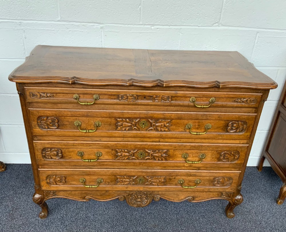 ornately carved french oak chest of drawers