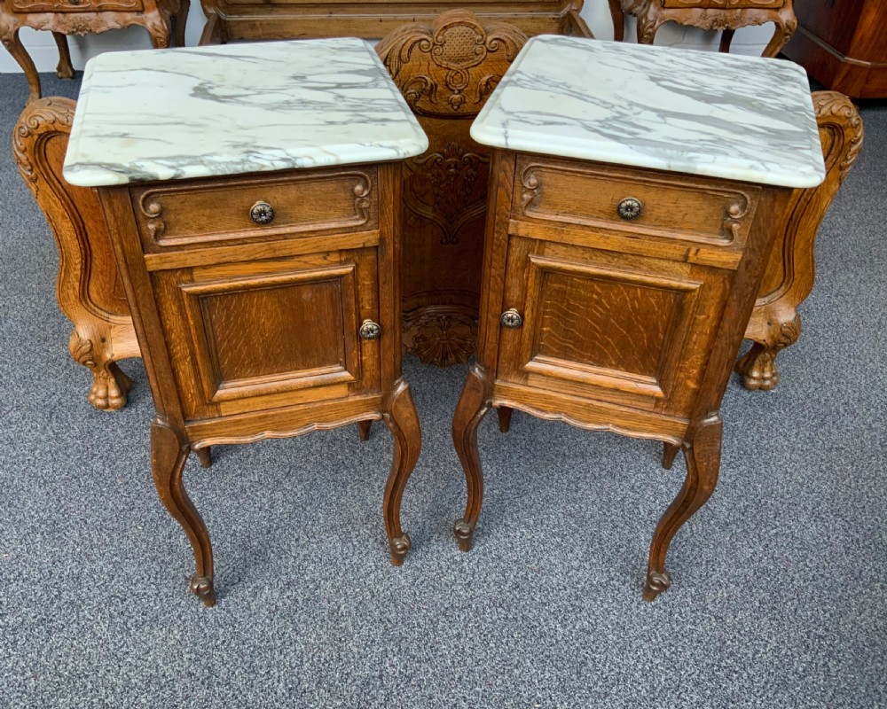 pair of french oak bedside cabinets